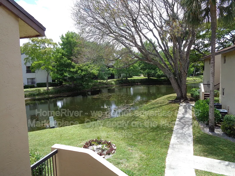 Building Photo - 3713 Cocoplum Cir #3545