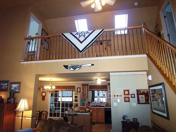 Vaulted ceiling with skylights adds drama to the living space