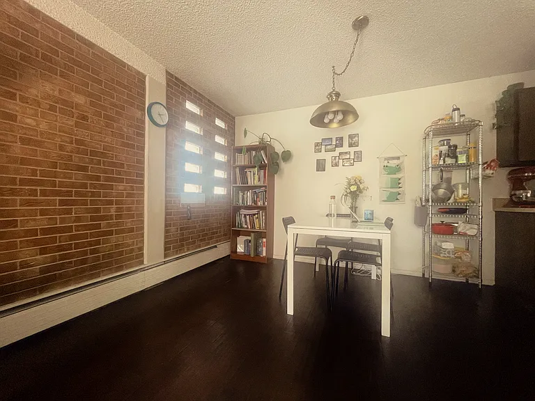 Dining room (a dining table, four chairs, and a bookshelf included)