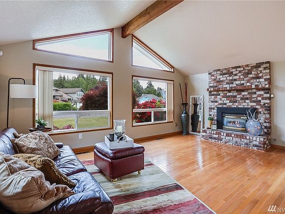 Spacious living room with large windows for natural light