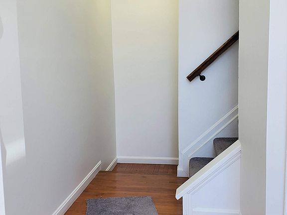 Entrance with coat closet and half bath.