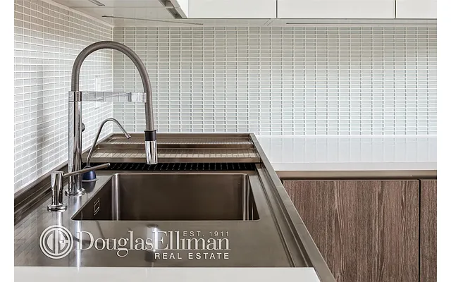 Sold by Douglas Elliman | media 22