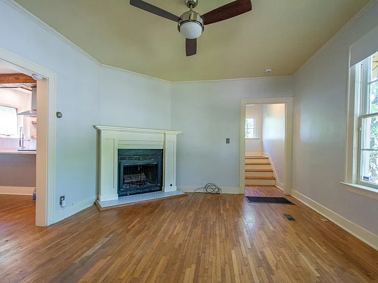 Living room with wood burning fireplace