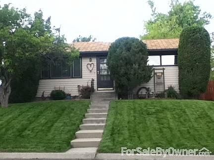 Front of house
						:
						Please notice mature trees and producing plum tree in yard