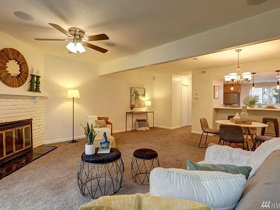 Open Spacious living areas with cozy wood burning fireplace!