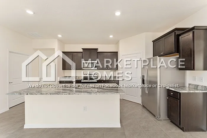 4170 NW 48th Terrace Rd — Photo 7