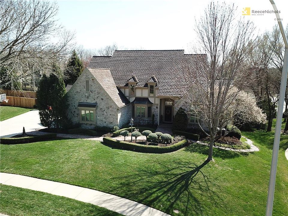 Curb appeal A+ for this inviting Patrician Woods beauty!