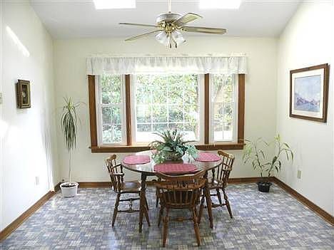 Breakfast Area with Vaulted Ceiling and Skylights