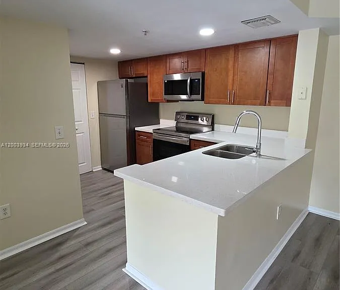 5051 Wiles Rd #201 — Photo 13