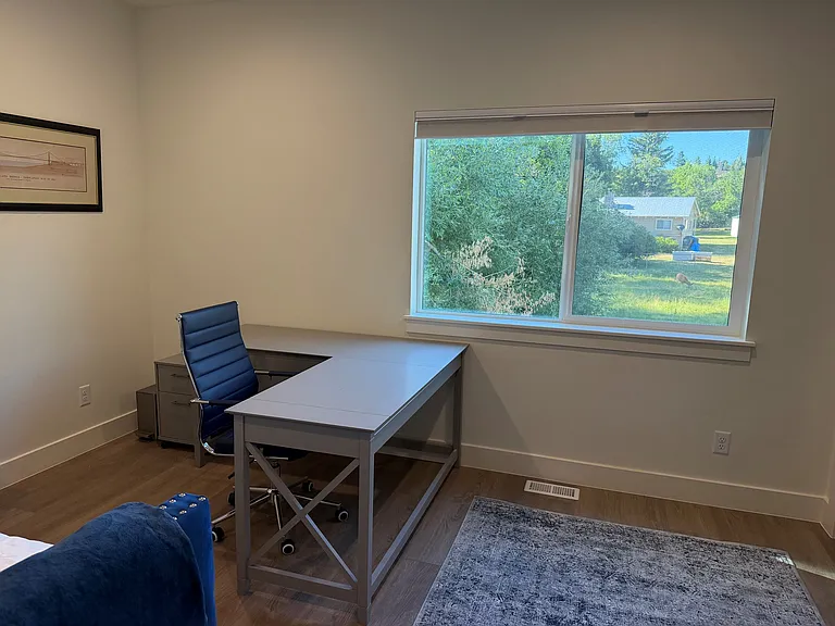 Main level bedroom that doubles as an office