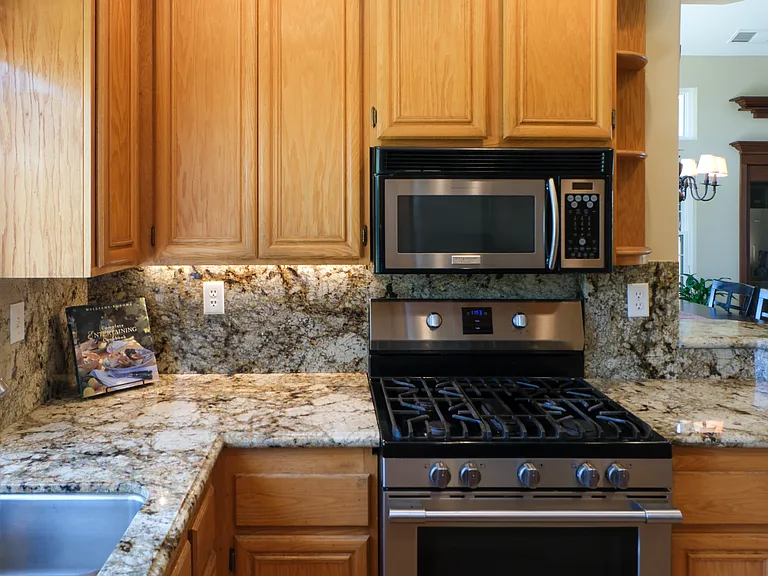 5-burner stove with center griddle burner