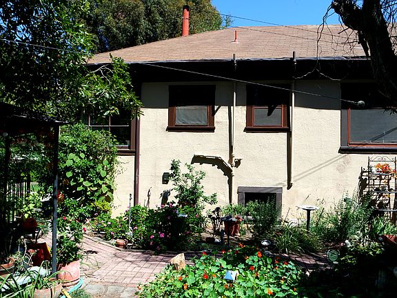 1 of 2 fenced in side yards