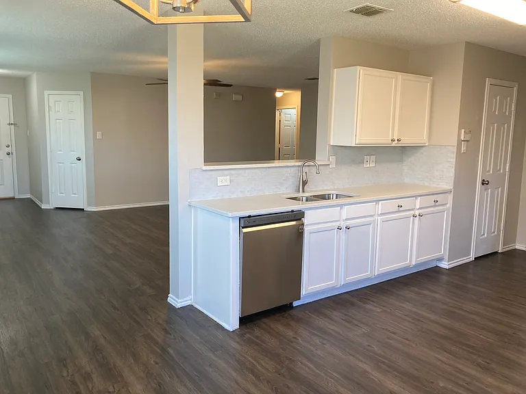 Kitchen, dining room open to living room with large Great Room effect
