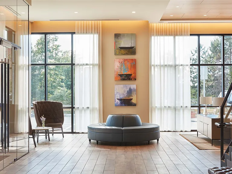 Step into a bright, open lounge where natural light takes center stage