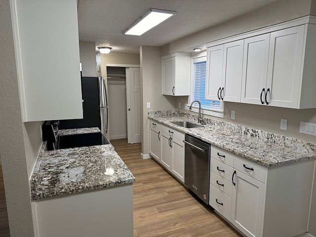 Brand New Kitchen with Stainless Steel Appliances and Granite Countertops.