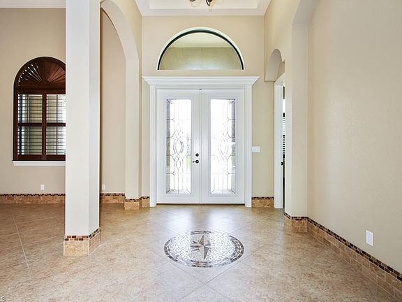 High impact leaded glass double door entry..