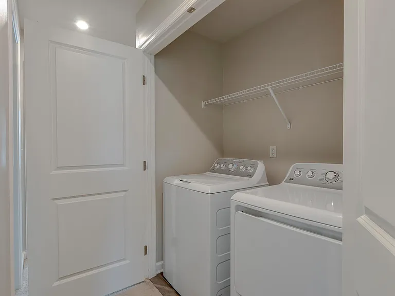 Laundry room in upstairs hallway
