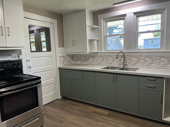 New lower IKEA kitchen cabinets! Stainless steel appliances.