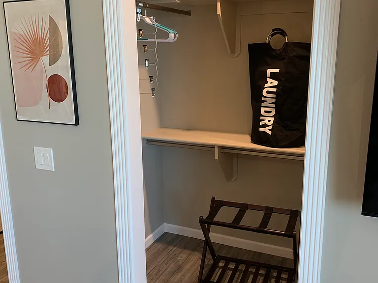 A walk in closet with plenty of space within the Master Suite