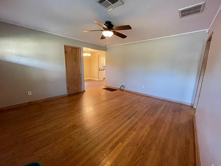 Living room looking into dining/kitchen