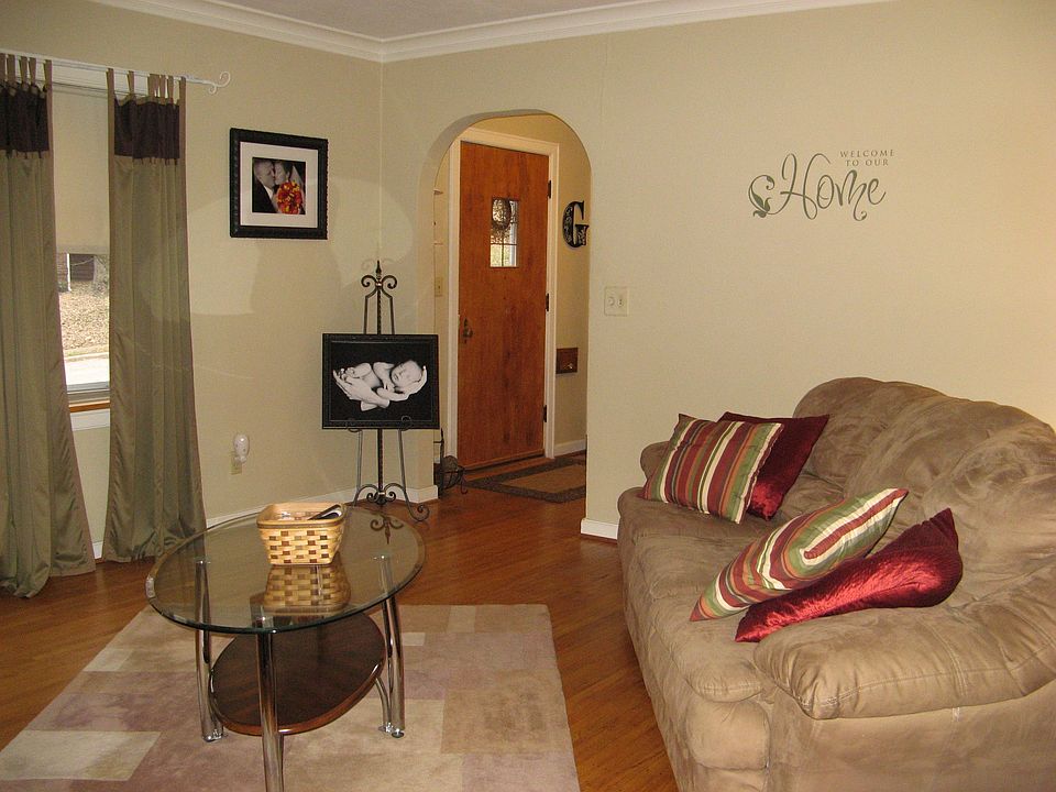 Front door to living room.  Hardwood flooring 