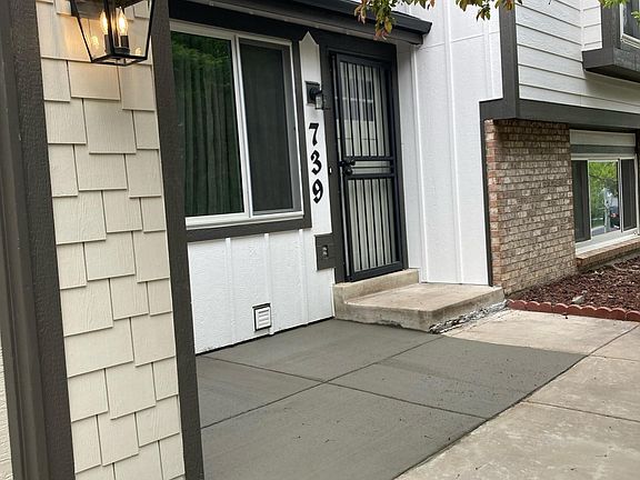 Front of house front door with a security door.