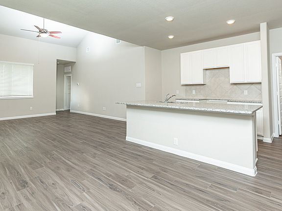 Dining Area to Kitchen and Family Room