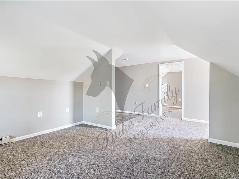 Living room, looking into the main bedroom
