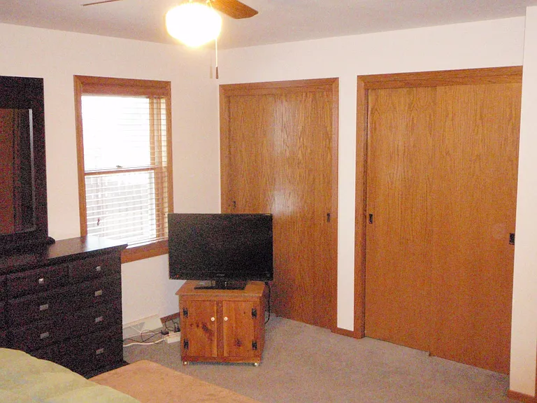 Master bedroom has 2 separate closets, plus a third walk in closet (located to the right of this photo)
