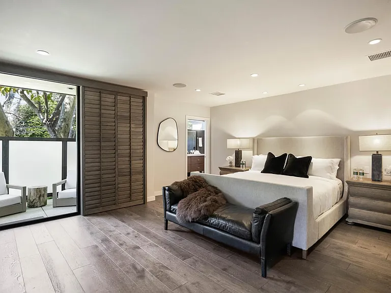 Experience unparalleled luxury in the master bedroom, featuring a spacious layout, plush furnishings.