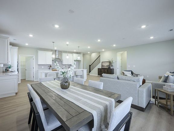 Open Concept Layout Featuring the Kitchen and Cafe Dining Area