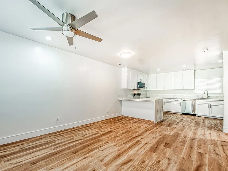 Family Room: TV Mount & Ceiling Fan, LED Lighting, LVP Flooring, Central Heating & Cooling, New Windows.