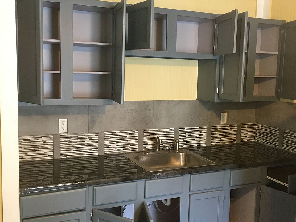 Kitchen Stainless steel sink and porcelain backsplash