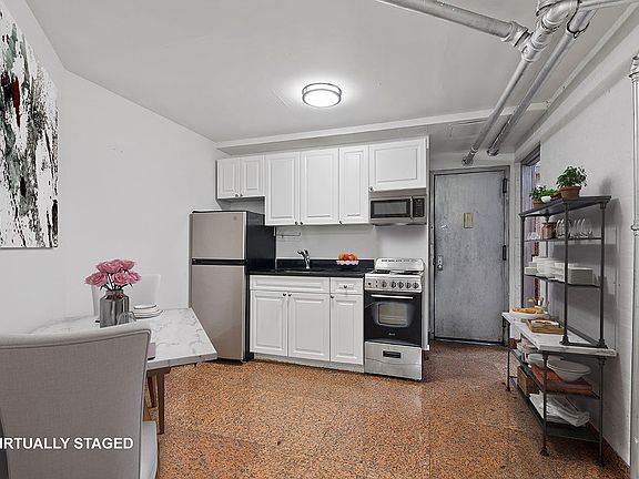2nd image of 112 E 97th St APT B