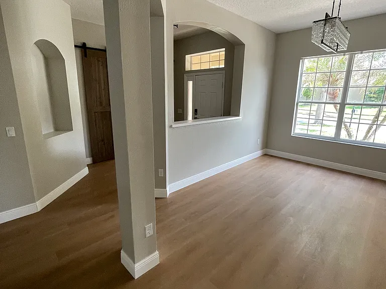 Front door entry and formal dining
