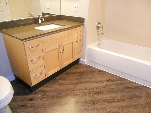 Bright bathroom w/ vanity storage