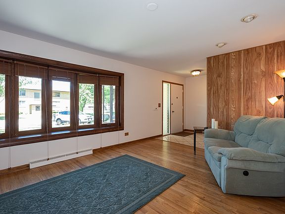 Family Room and Bay Windows overlooking Front Lawn