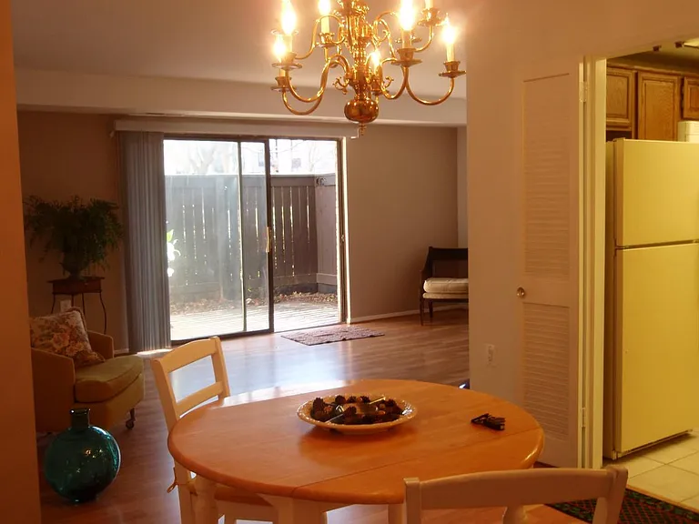 Dining room to patio. Note that new sliding door has been installed and it looks much better.