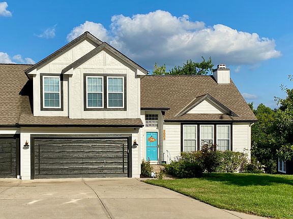 Front of house with 3 car garage