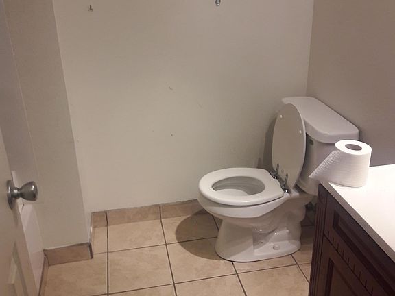 Front hallway bathroom. Full bath.
