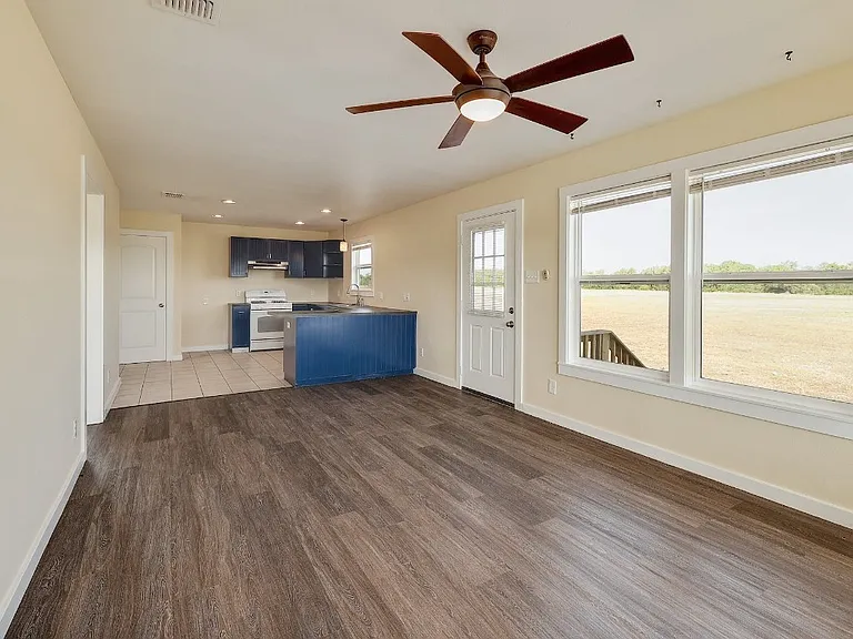 Living space coming in from the front door.