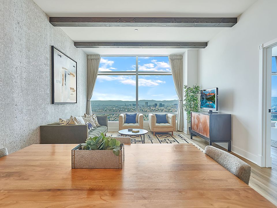 Upgrades include custom wood beams, wide plank luxury flooring, custom wall paper and fixtures, custom kitchen cabinetry color scheme and more.