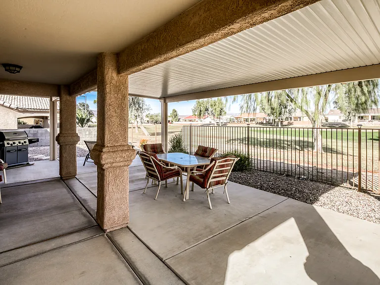Backyard, Covered Patio, Fenced In with Gate to Golf Course