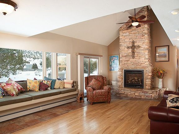 This home's custom window seat has room for the whole family - and makes the liv
