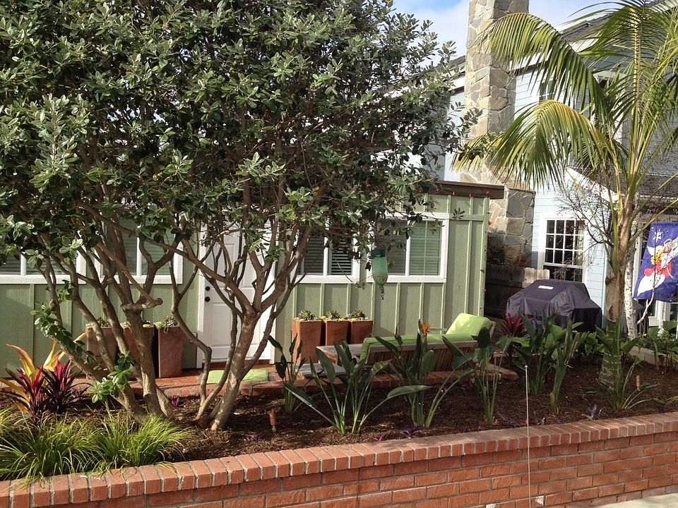 Inviting curb appeal with social patio