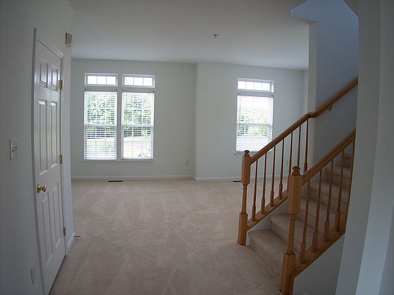 2nd level-LR, Pwdr Rm, Eat-In Kitchen, Deck