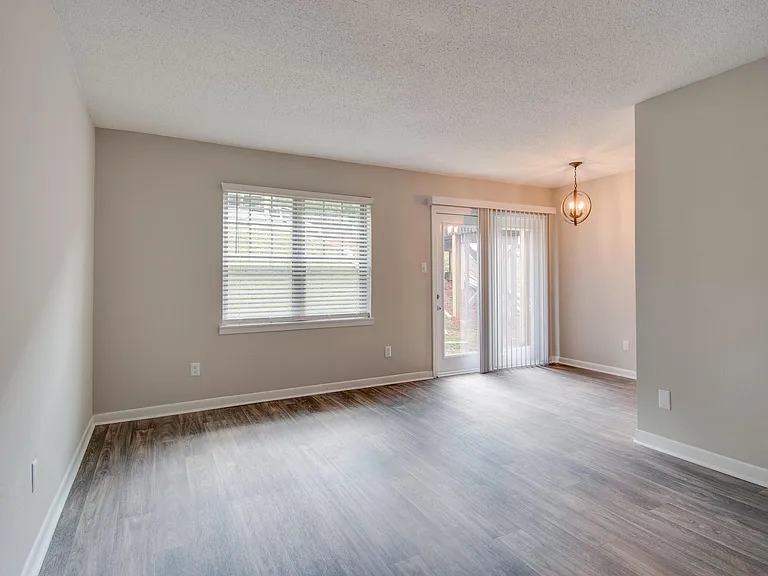SPACIOUS LIVING ROOM IN THE MADISON LANDING AT RESEARCH PARK AND THE COTTAGES