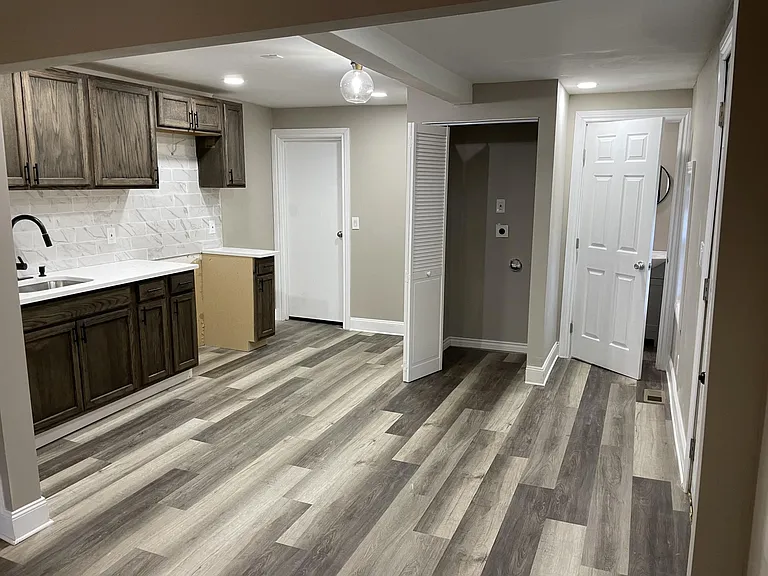Kitchen, Utility Room, and Bathroom (Please note: Kitchen appliances, washer, and dryer will be provided)
