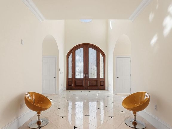 Elegant foyer with striking arches.