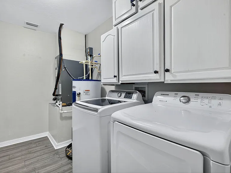 In-Residence Laundry Room with a full-size washer & dryer